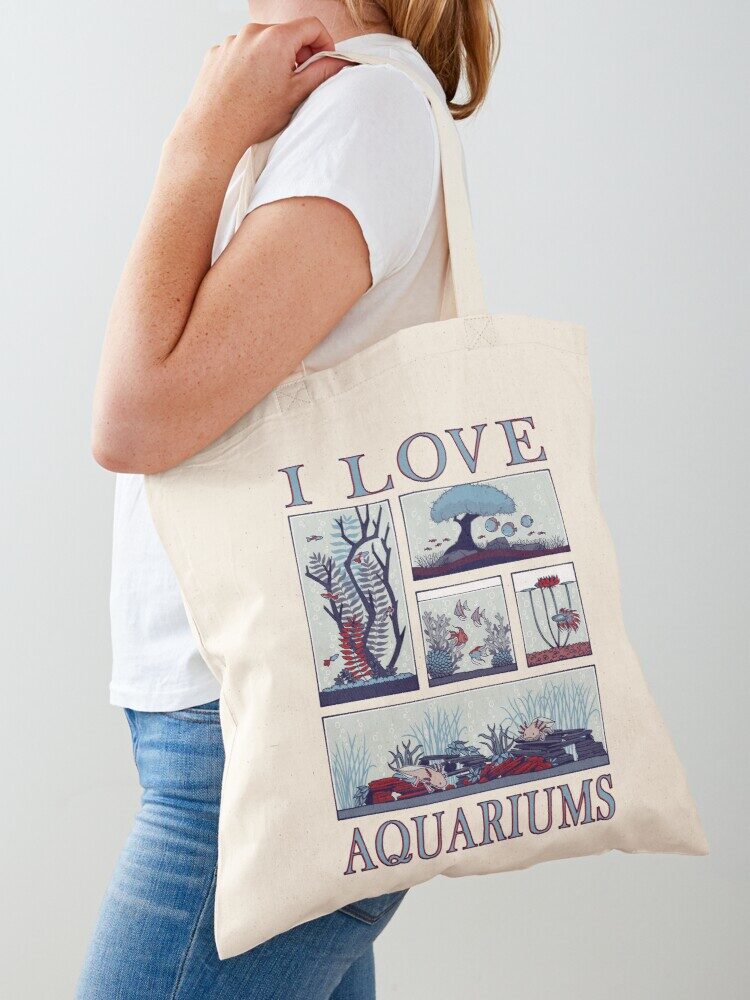 Photo mock-up of 'I Love Aquariums' printed on a tote bag.