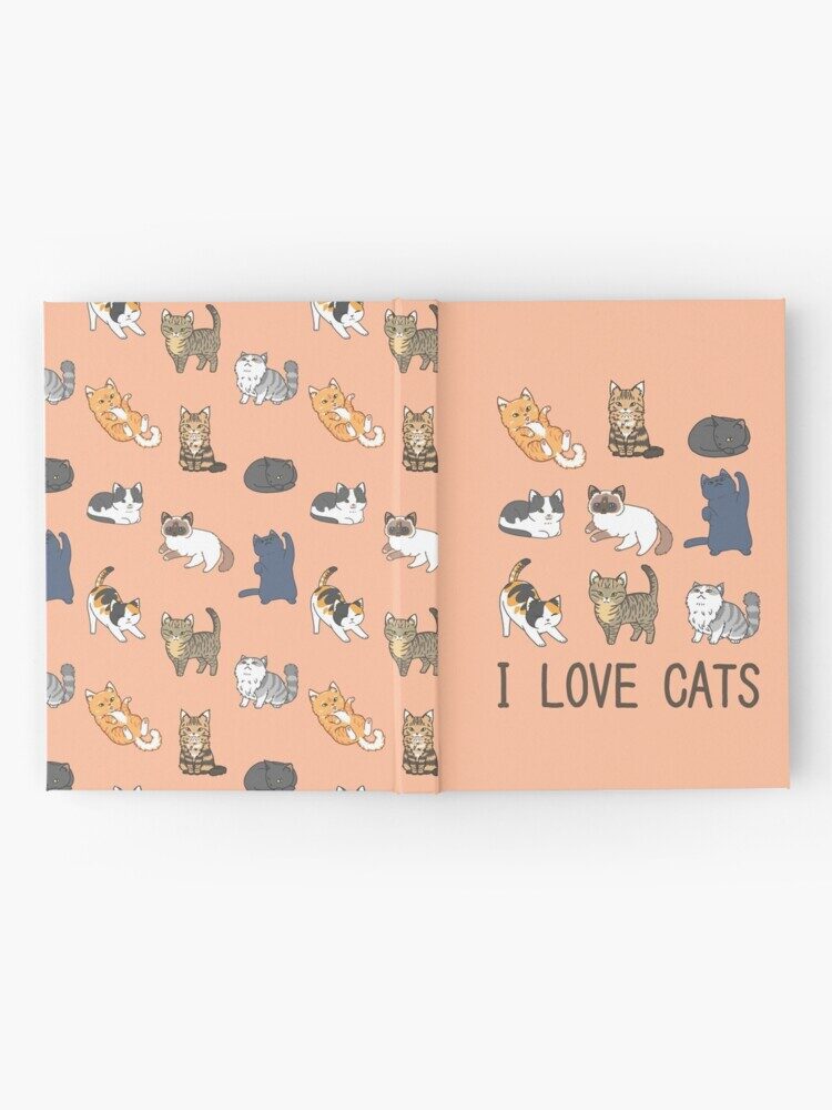 Photo mock-up of 'I Love Cats' and 'Chibi Cats Pattern' printed on a hard cover book.